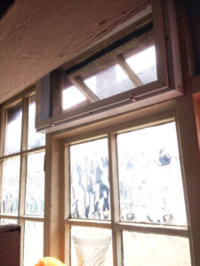 A white screen and sub frame on a window