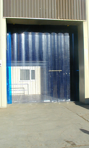 Heavy Duty PVC Strip Curtain hanging in a warehouse door