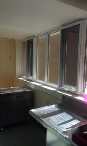 White fly screens on sub frame in a kitchen