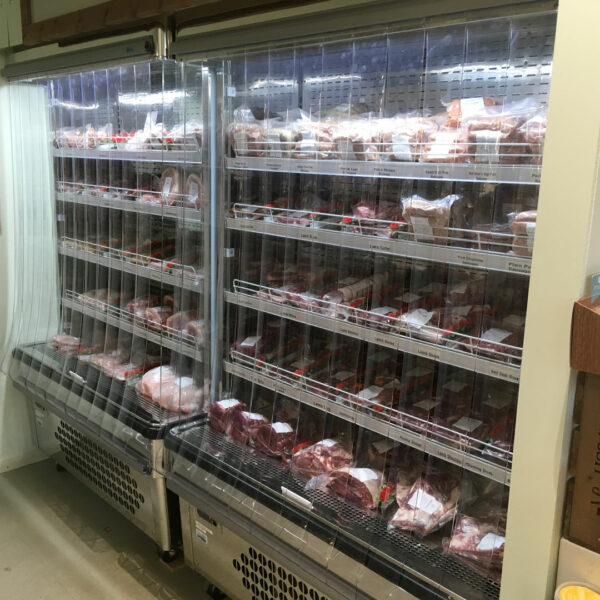 A meat shelf in supermarket with pvc strips fitted to protect